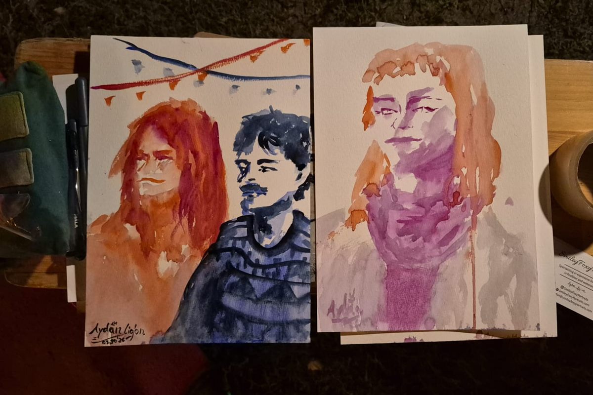 Live-drawn watercolour portraits from the Saunasplash event on Aydan's drawing table