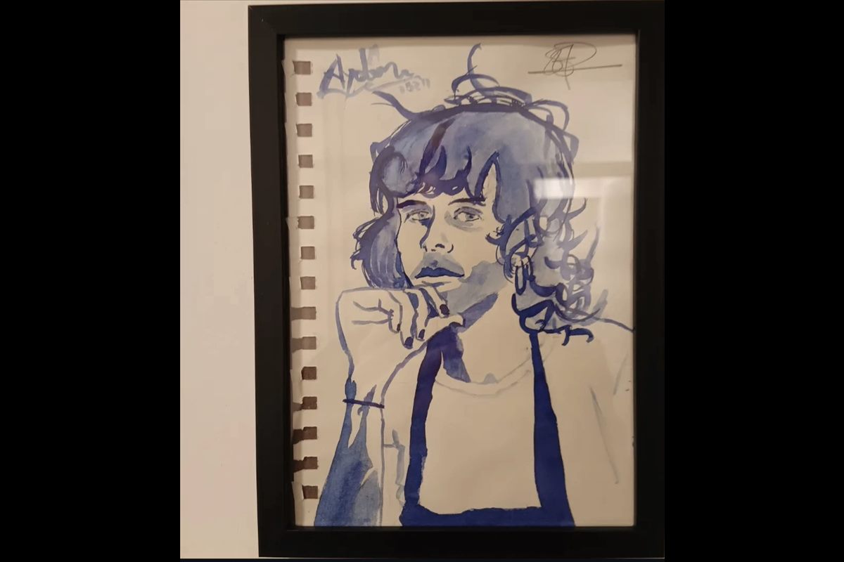 Framed staff portrait on the wall of the Spaghetteria
